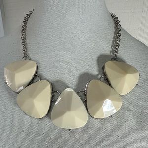 Abstract triangle beige and silvertone necklace